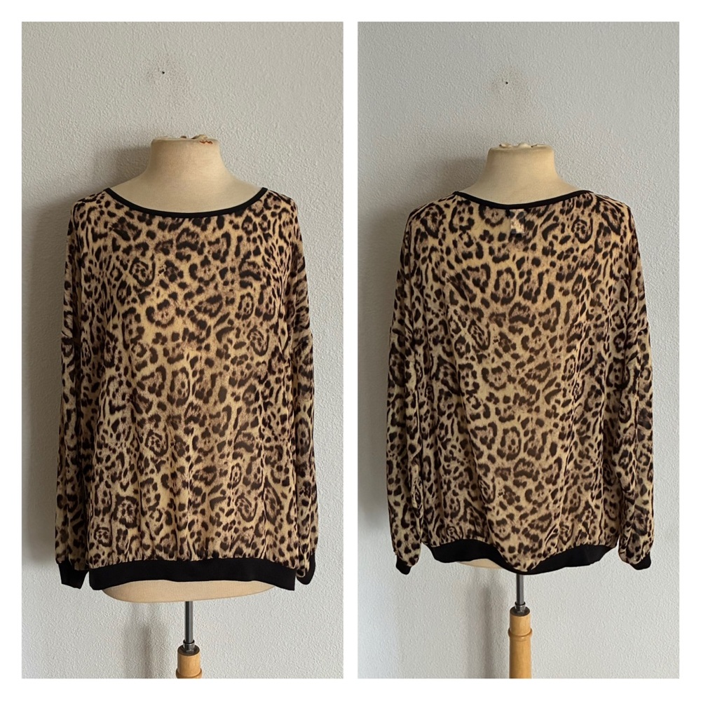 Torrid sheer animal print blouse